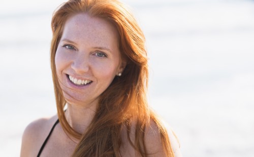 Portrait of woman on beach.
