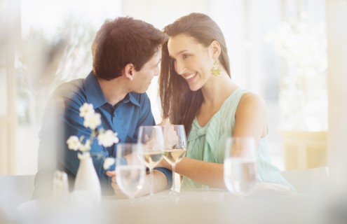 Couple sitting in restaurant.