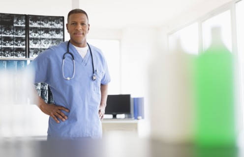 Portrait of male doctor in hospital.