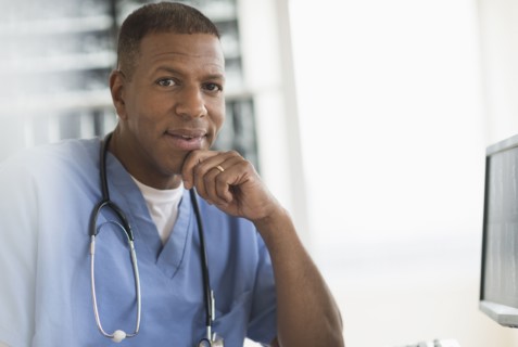 Portrait of male doctor in hospital.
