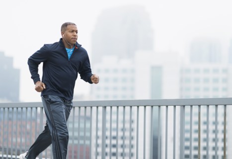 Man running in city.