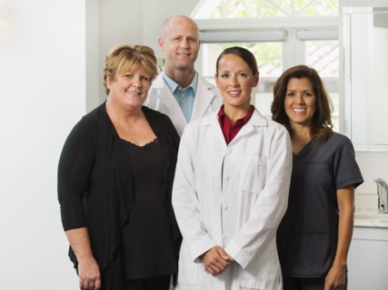 Portrait of dentists and assistants.