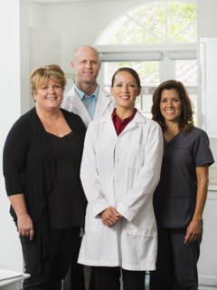Portrait of dentists and assistants.