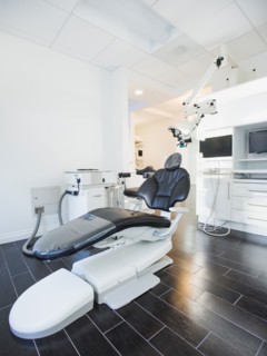 Empty dentist's office with modern equipment.