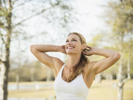 Woman smiling and looking up.