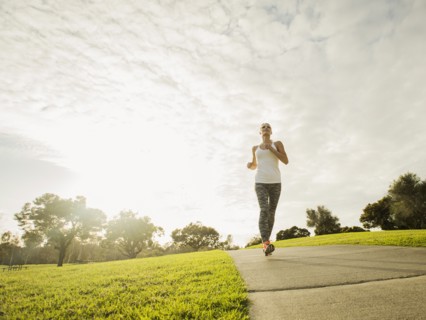 Woman running in park.