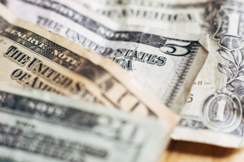 Studio shot of United States paper currency.
Photo : Kristin Lee