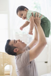 Father playing with his son (6-11 months).
