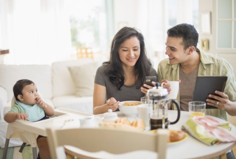 Family with baby son (6-11 months) in dining room.