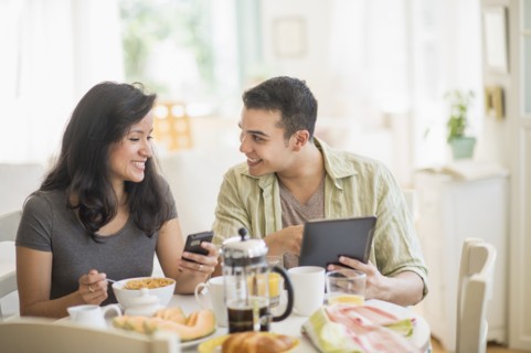 Couple in dining room.