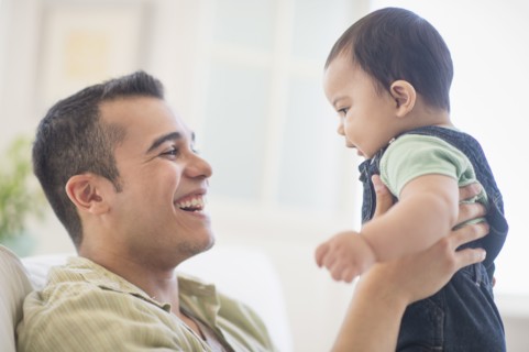 Father playing with his son (6-11 months).