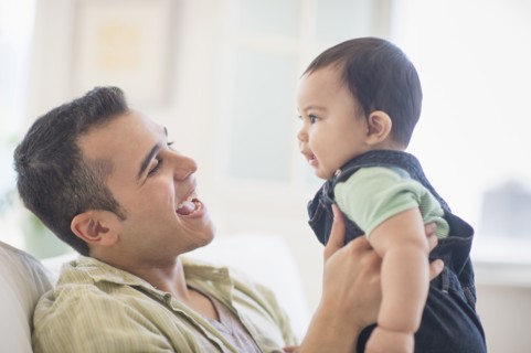Father playing with his son (6-11 months).