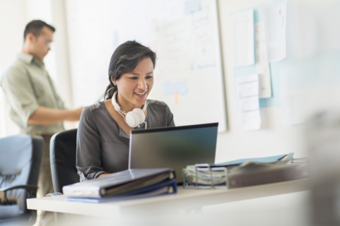 Two people working in office.