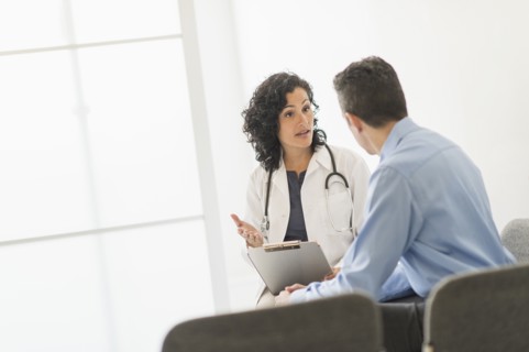 Doctor talking to patient.