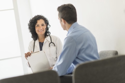 Doctor talking with patient.