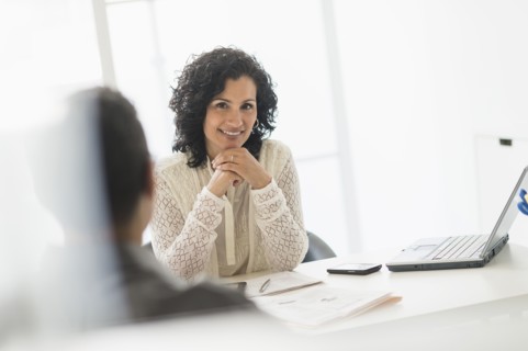 Portrait of businesswoman in office.