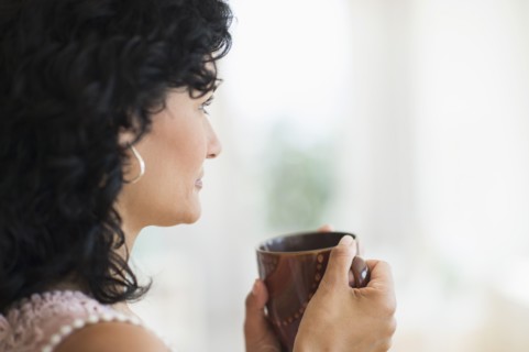 Woman enjoying her tea.