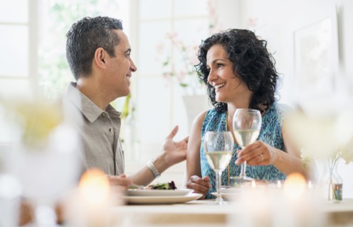Couple dining in restaurant.