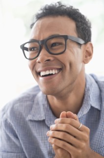 Portrait of young man smiling.