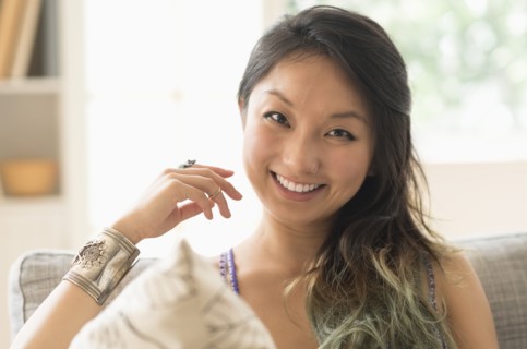 Portrait of young woman smiling.