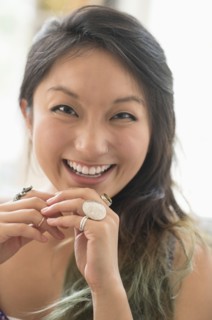 Portrait of young woman smiling.