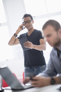 Men working in office.