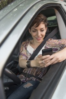 Female driver text messaging.