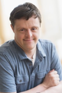 Portrait of man with down syndrome.