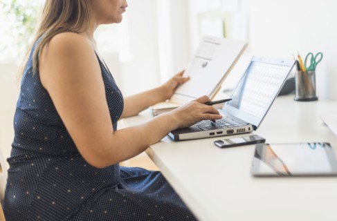 Woman working in home office.