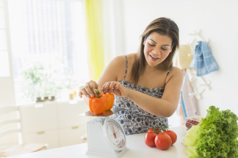 Woman preparing meal.