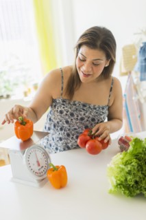 Woman preparing meal.