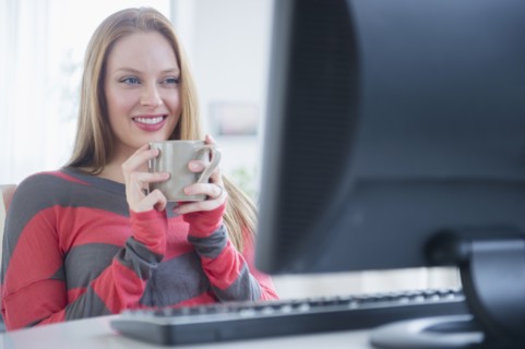 Young woman in front of computer