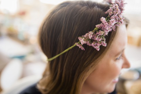 Woman with flowers on head