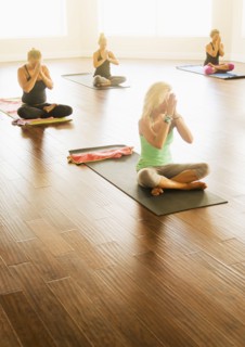 Women exercising yoga