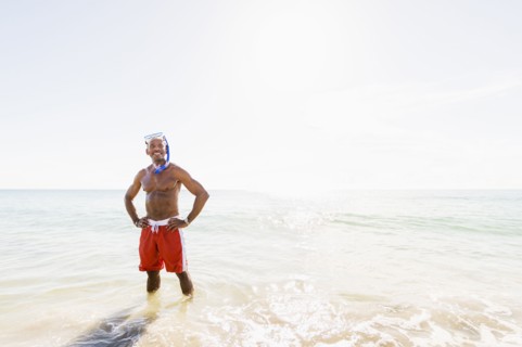 Portrait of mature man on beach