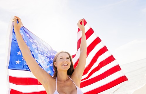 Woman holding American flag