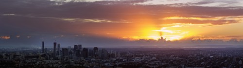 Panoramic view of city at sunrise