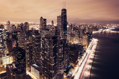 Elevated view of Lake Shore Drive and Chicago architecture at sunset