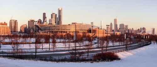 Soldier Field and city skyline at sunrise