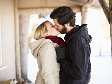 Young couple kissing outdoors