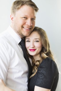 Studio portrait of young couple smiling