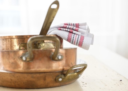 Studio shot of copper pans.