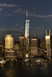 Aerial view of city with Freedom tower at night. New York City, New York.