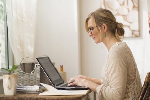 Woman working with laptop.