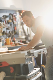 Man working in workshop.