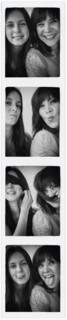 Photo booth picture of teenage girl (14-15) and her mom