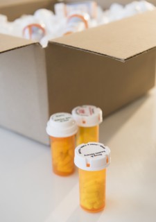 Cardboard box and medicine containers