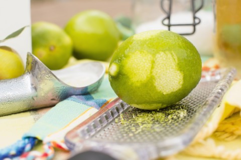Studio shot of lime and grater