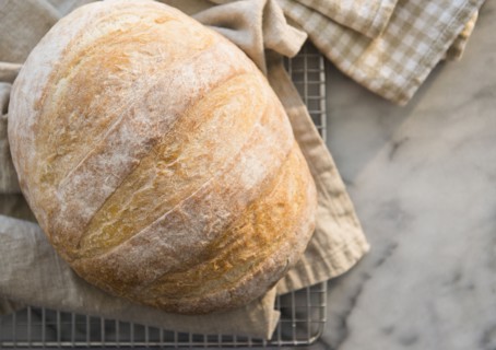 Studio shot of bread on dishcloth