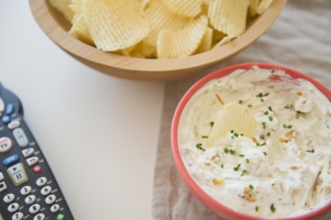 Studio shot of crisps and onion dip
